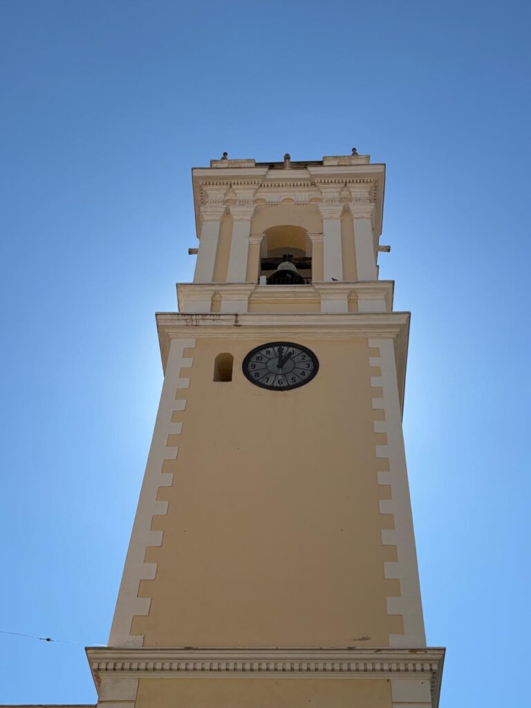 implementation of weekly consolidated cash flow report - bell tower with clock